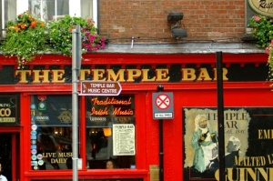 The Temple Bar pub in Dublin with signs, portrait